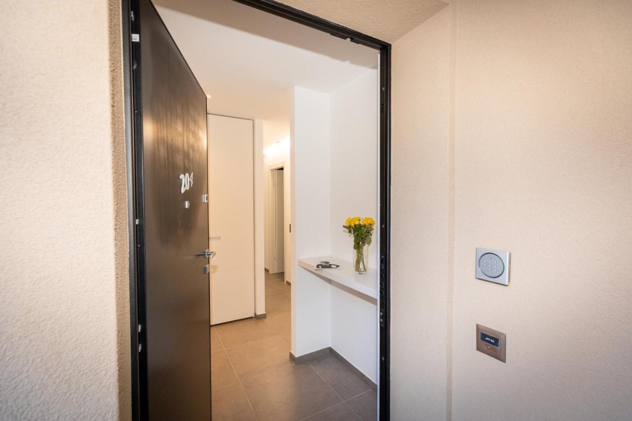 Residenza 3544 Aparthotel Lumino Bagian luar foto